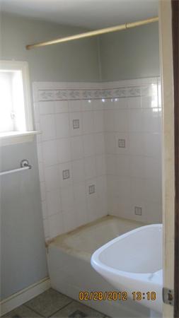 16 Plant Road Waltham, MA 02451 - Photo 6 of 18 a bathroom with a tub