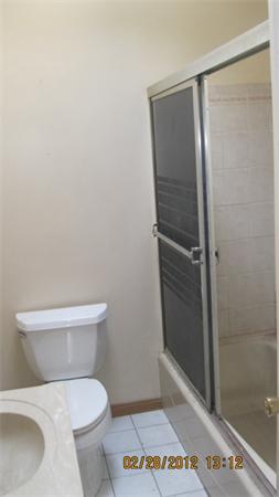 16 Plant Road Waltham, MA 02451 - Photo 7 of 18 a white toilet sitting next to a shower