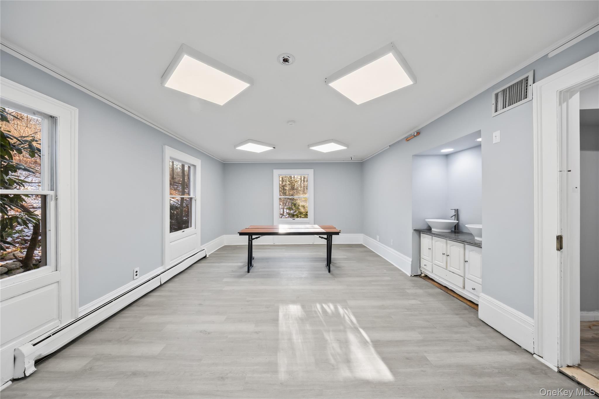 996 Haverstraw Road Suffern, NY 10901 - Photo 11 of 50 a living room with furniture and a large window