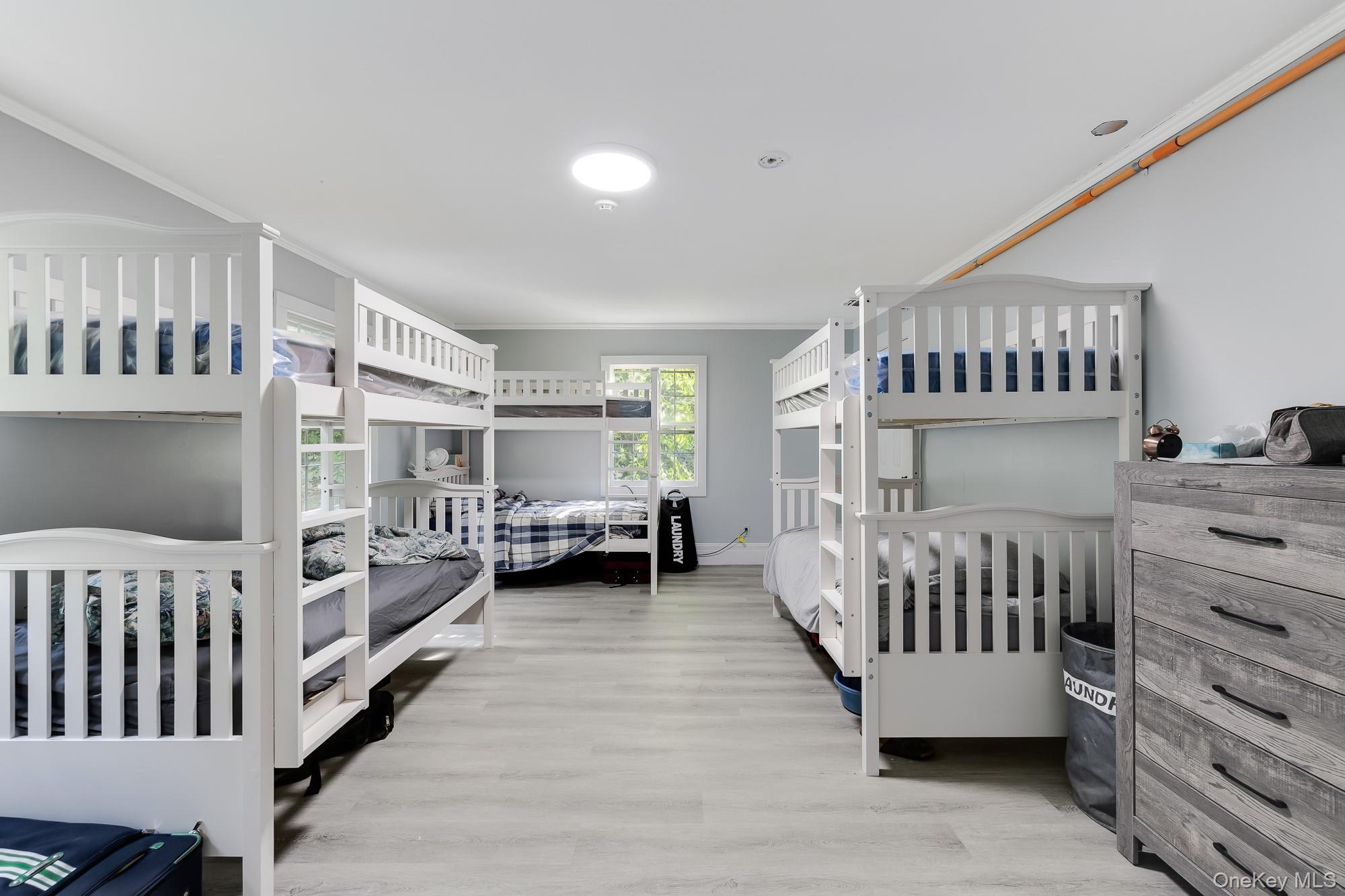 996 Haverstraw Road Suffern, NY 10901 - Photo 20 of 50 a bedroom with furniture and baby crib