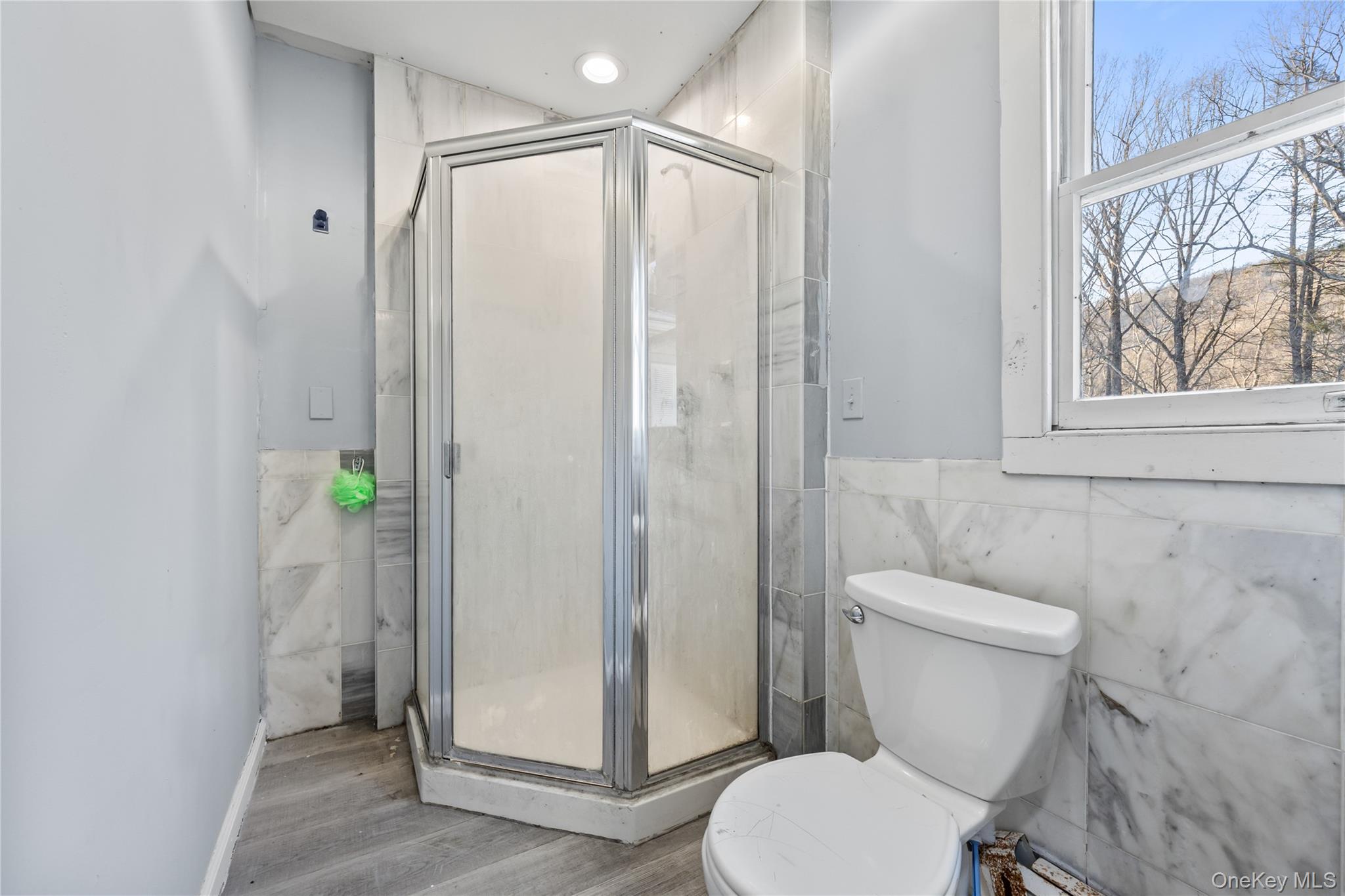 996 Haverstraw Road Suffern, NY 10901 - Photo 28 of 50 a white toilet sitting next to a bathroom sink