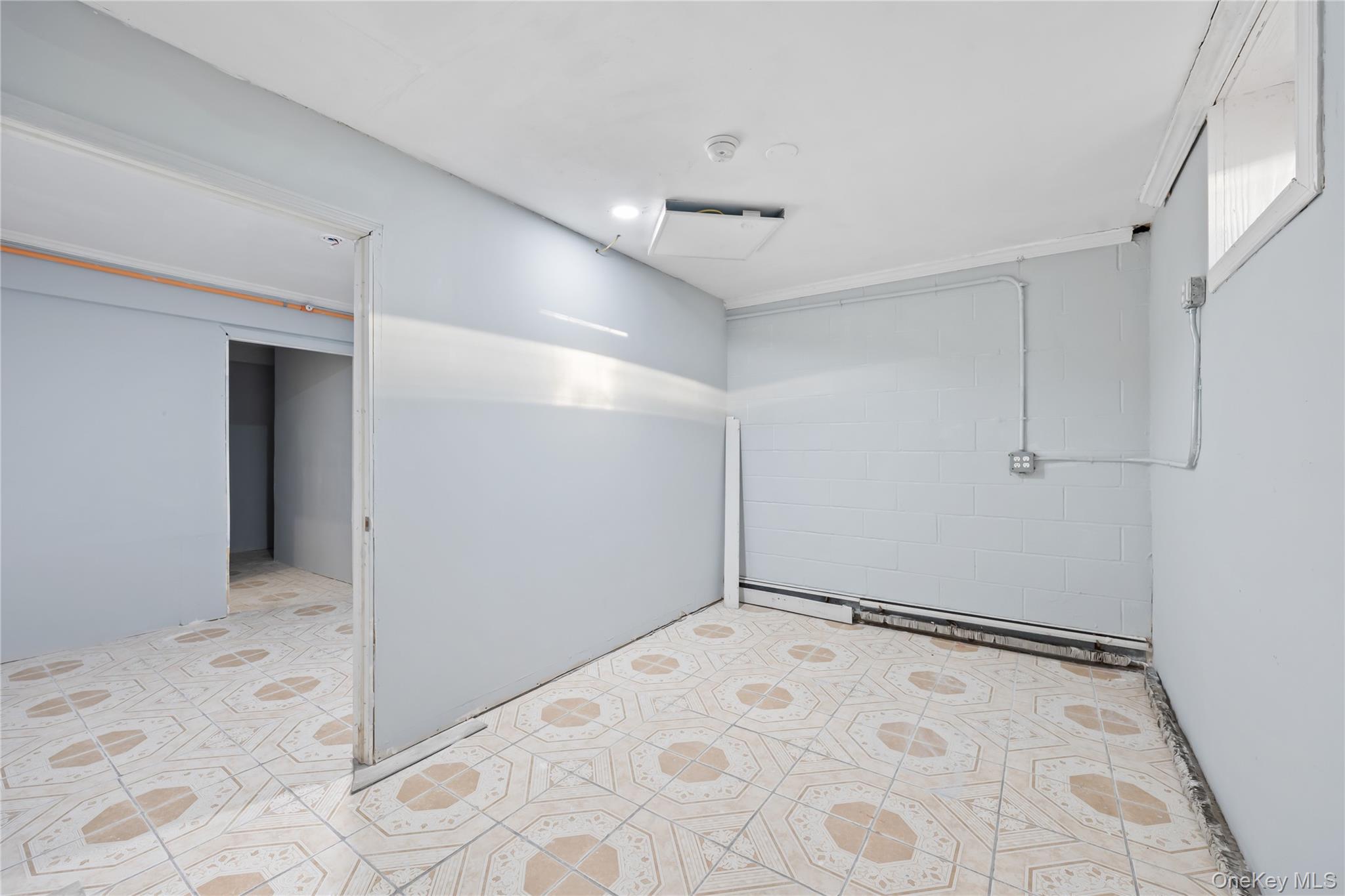 996 Haverstraw Road Suffern, NY 10901 - Photo 34 of 50 a view of a big room with an empty space