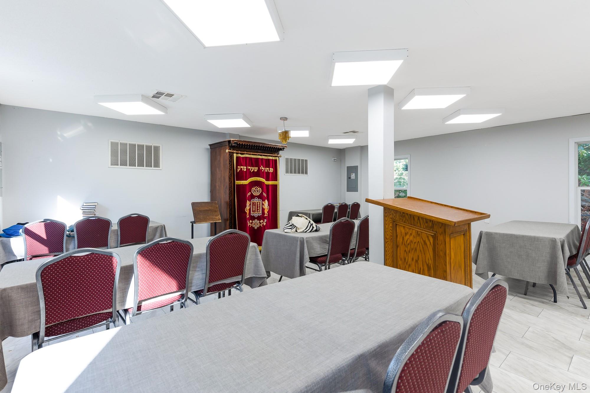 996 Haverstraw Road Suffern, NY 10901 - Photo 37 of 50 a living room with furniture and a flat screen tv
