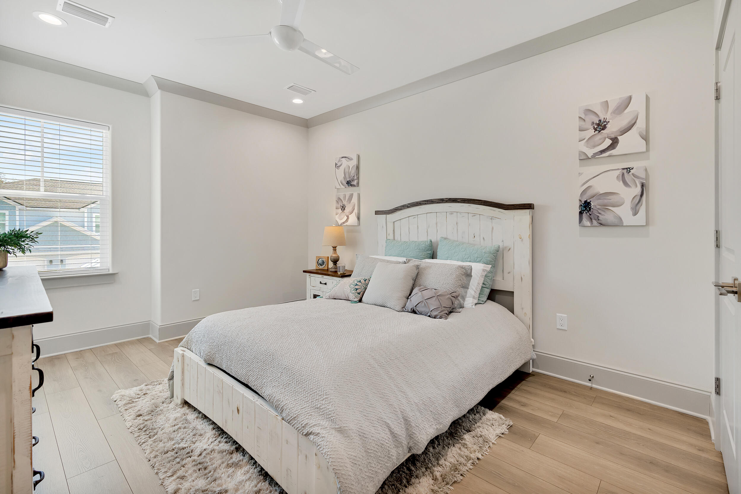 135 Golden Bell Ct Inlet Beach, Unit 135D Inlet Beach, FL 32461 - Photo 26 of 44 a bedroom with a large bed and a window