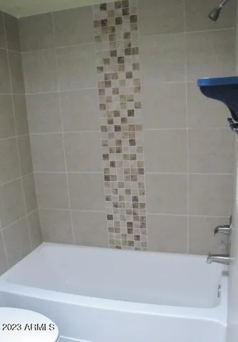 a bathroom with a bathtub