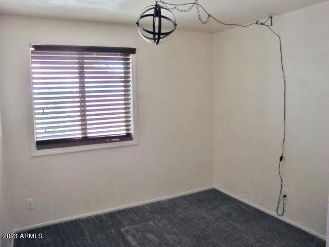 a view of a small space with racks on the wall