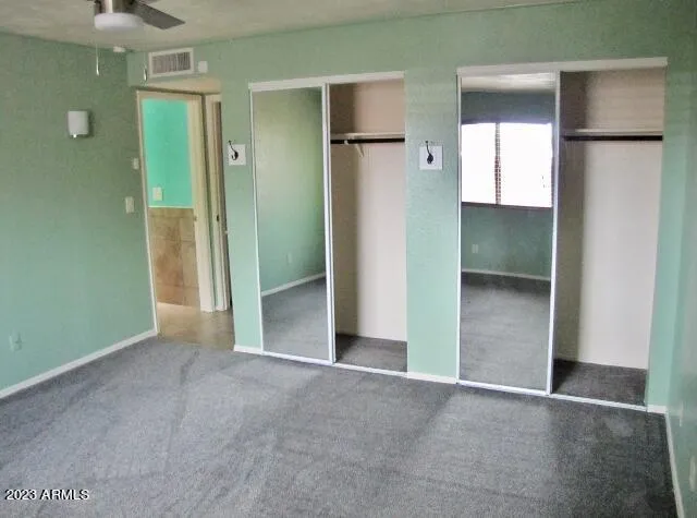 a front view of a house with a garage