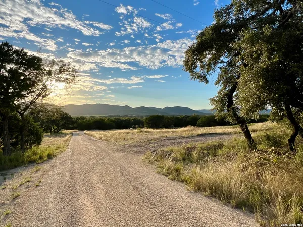 a view of a house with a street