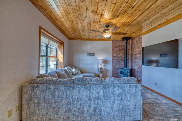 a view of a workspace with furniture