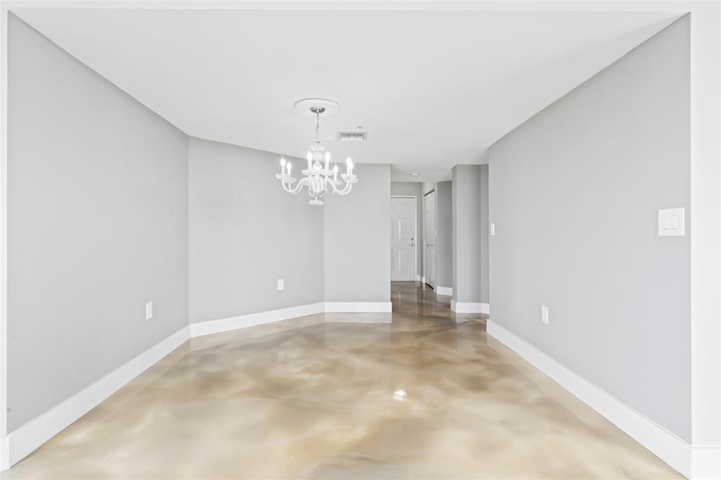 520 Southeast 5th Avenue, Unit 1504 Fort Lauderdale, FL 33301 - Photo 12 of 53 en view of an empty room with chandelier