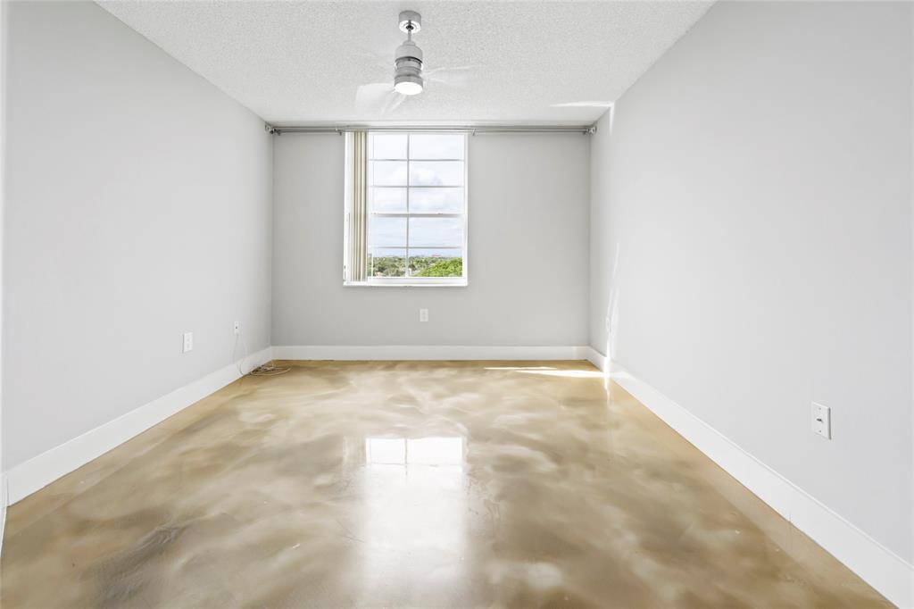 520 Southeast 5th Avenue, Unit 1504 Fort Lauderdale, FL 33301 - Photo 14 of 53 an empty room with windows