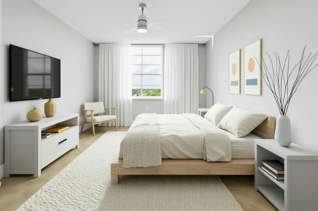 a view of a balcony with wooden floor and iron stairs