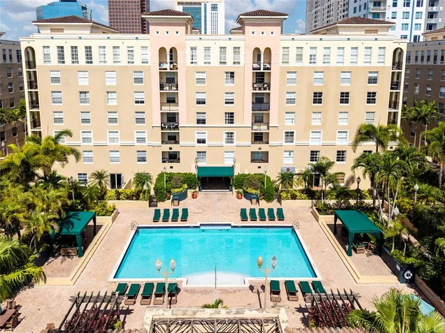 a view of a park with palm trees