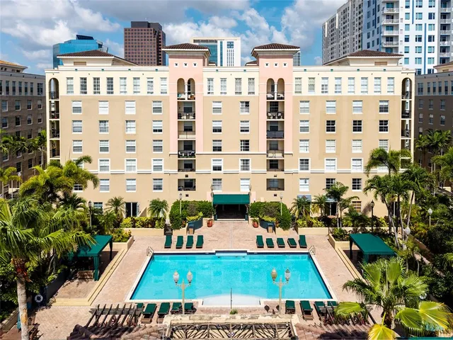 a view of swimming pool with outdoor seating