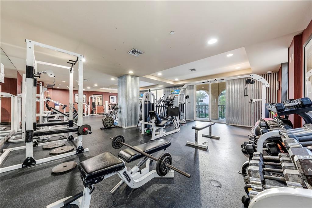 520 Southeast 5th Avenue, Unit 1504 Fort Lauderdale, FL 33301 - Photo 49 of 53 a room with gym equipment and a large window