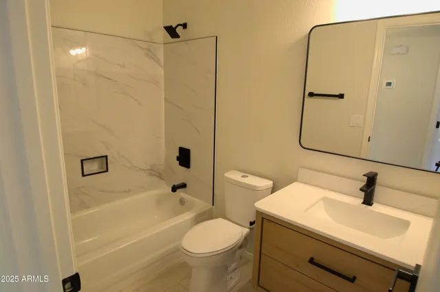 a view of a bathroom with a sink