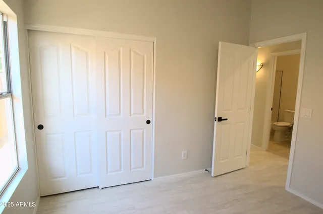 a view of an empty walk in closet
