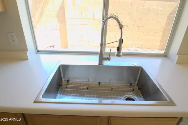 a view of a bathroom from the hallway