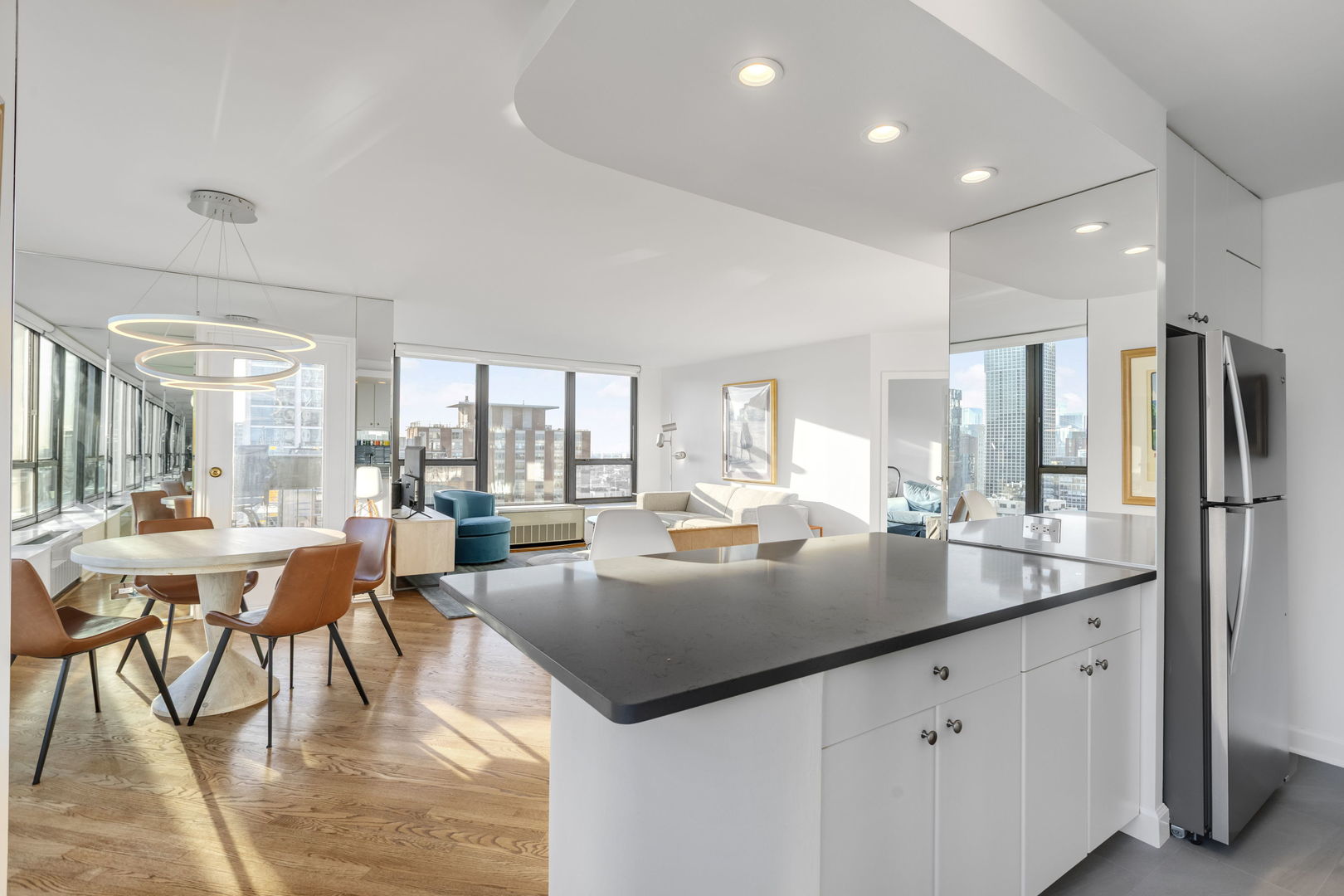 1313 North Ritchie Court, Unit 2401 Chicago, IL 60610 - Photo 15 of 29 a view of a kitchen and dining room