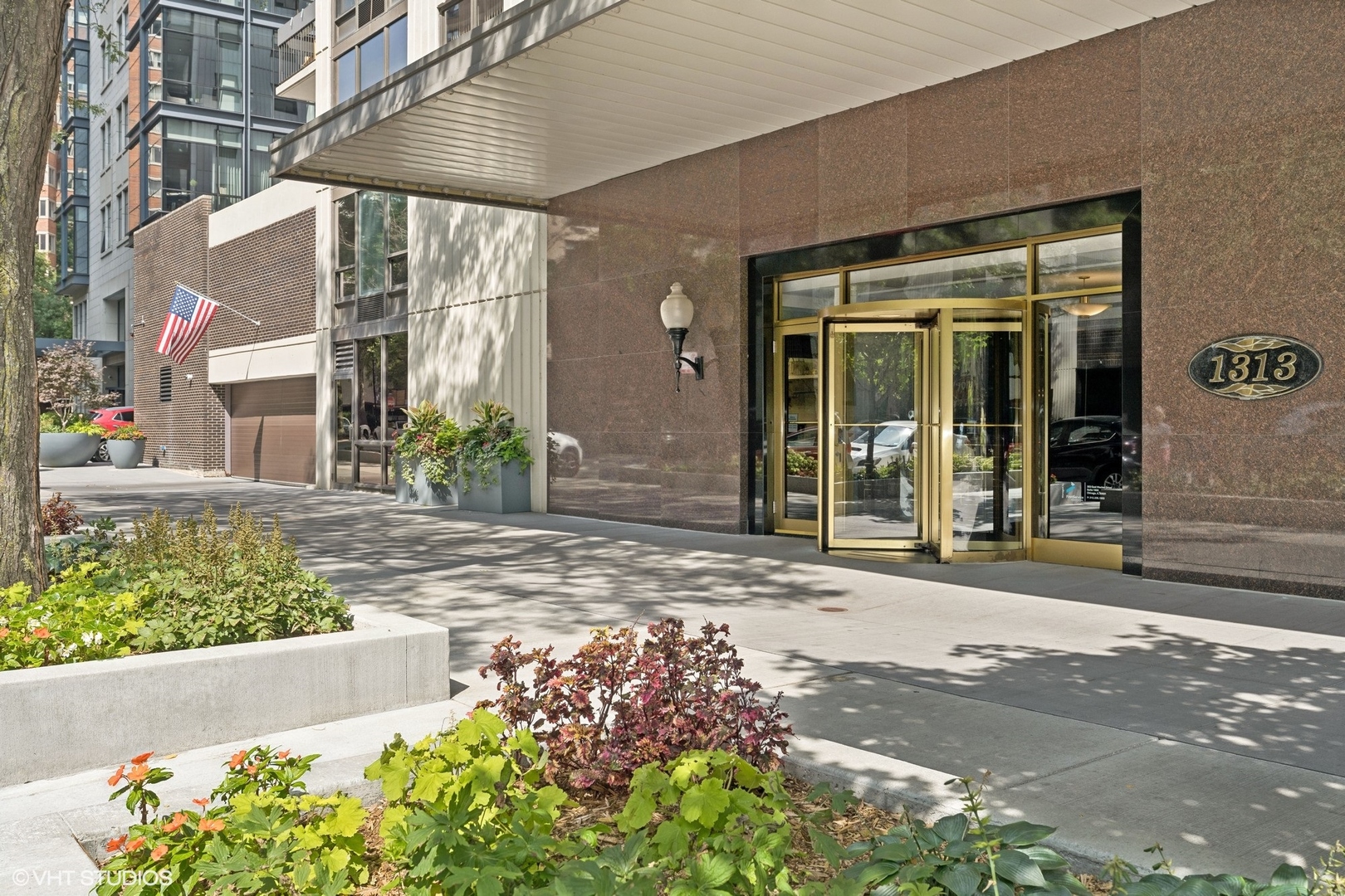 1313 North Ritchie Court, Unit 2401 Chicago, IL 60610 - Photo 2 of 29 a view of a pathway with a garden