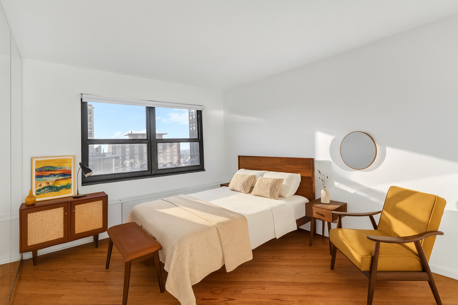 1313 North Ritchie Court, Unit 2401 Chicago, IL 60610 - Photo 22 of 29 a bedroom with a bed and next to a window with chair