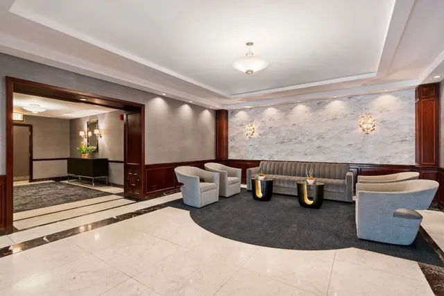 a living room with furniture and window