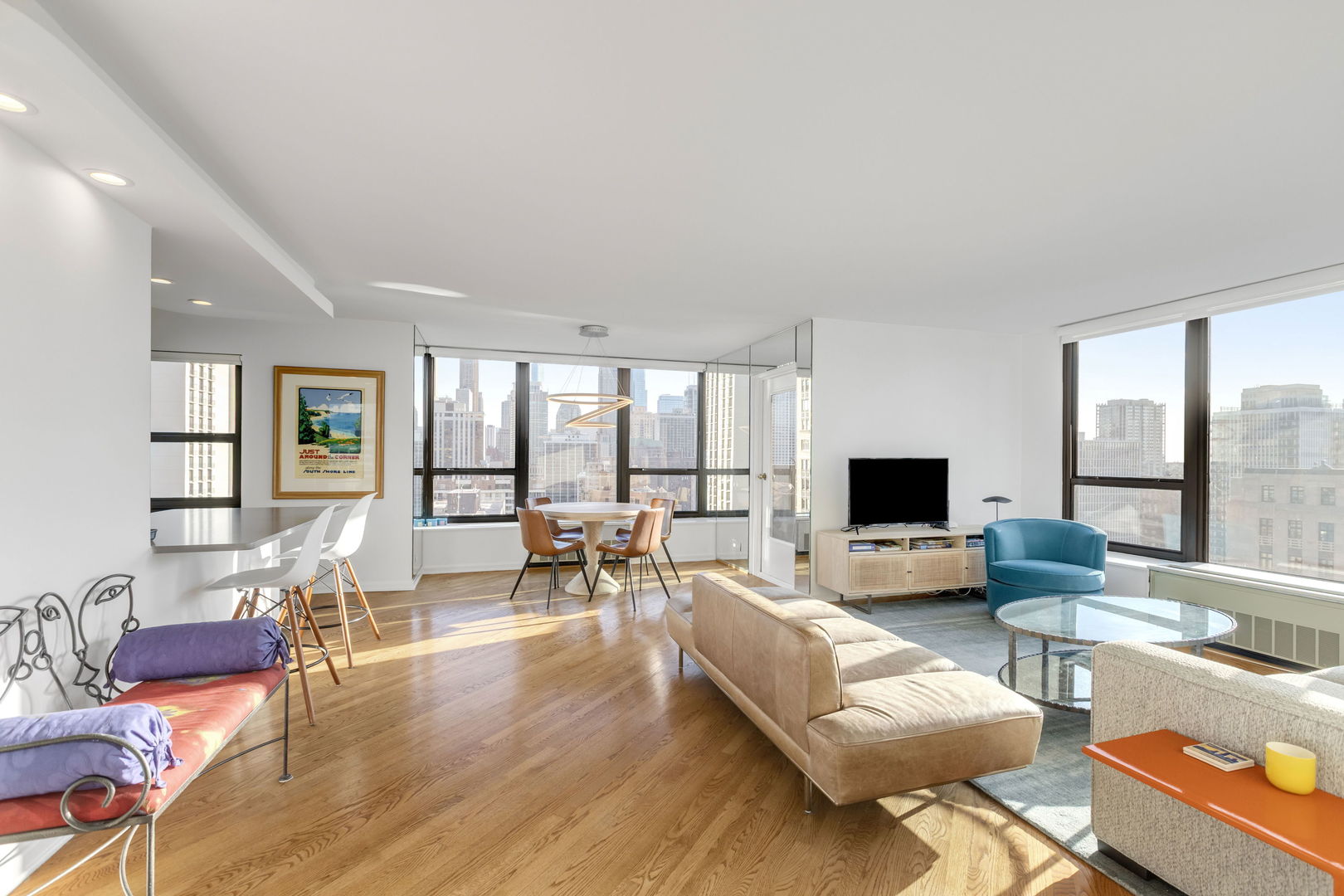 1313 North Ritchie Court, Unit 2401 Chicago, IL 60610 - Photo 4 of 29 a living room with furniture and a flat screen tv