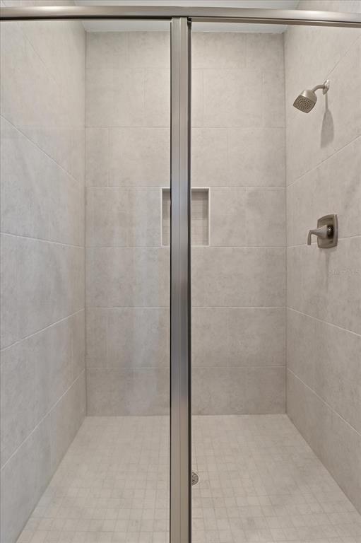 6349 Southwest 134th Loop Ocala, FL 34473 - Photo 23 of 45 a bathroom with a shower