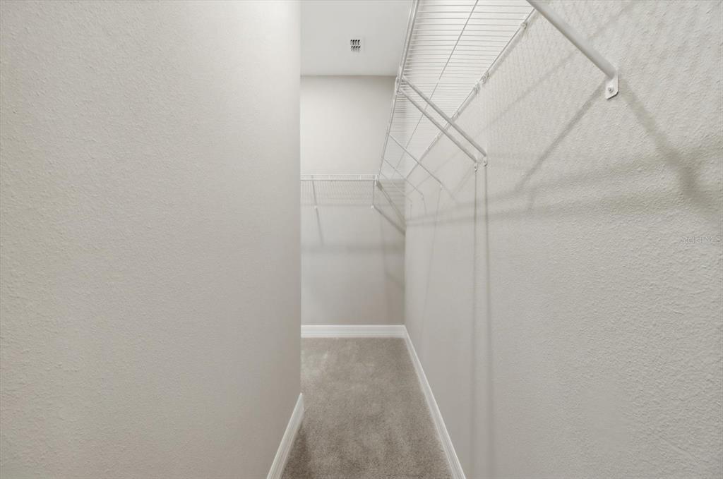 6349 Southwest 134th Loop Ocala, FL 34473 - Photo 25 of 45 a view of a room with white walls