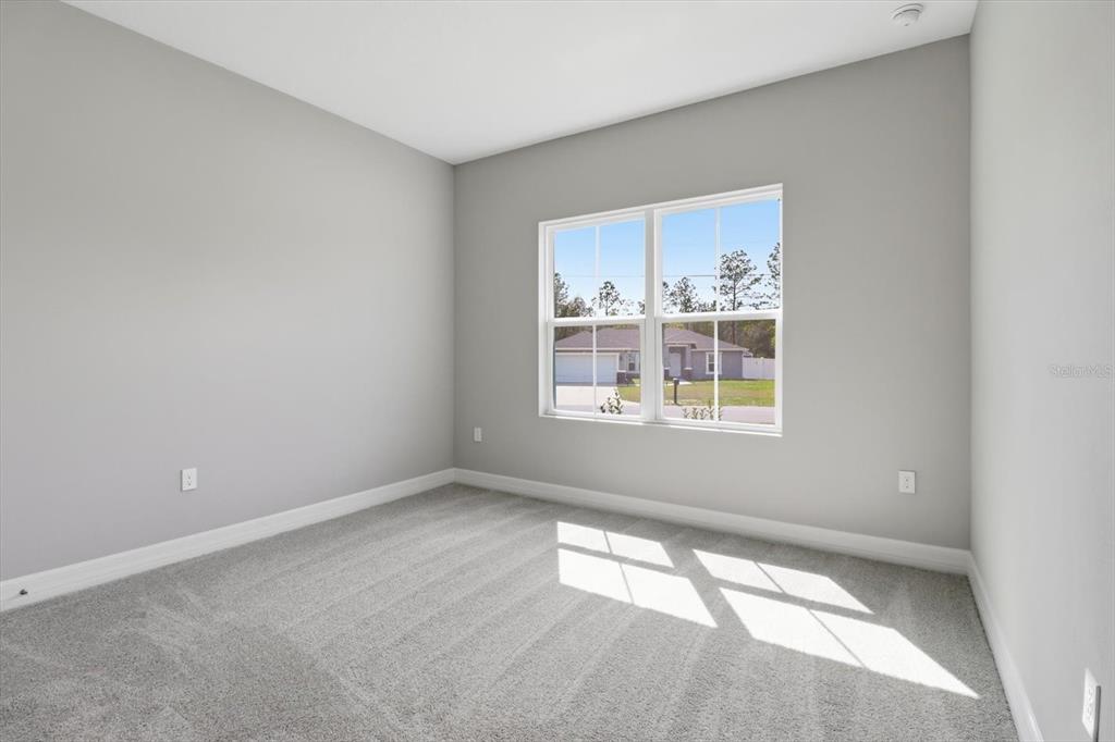 6349 Southwest 134th Loop Ocala, FL 34473 - Photo 33 of 45 a view of an empty room with a window