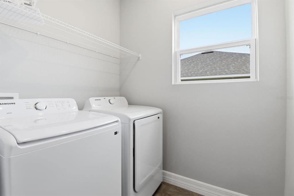 6349 Southwest 134th Loop Ocala, FL 34473 - Photo 36 of 45 a utility room with dryer and washer