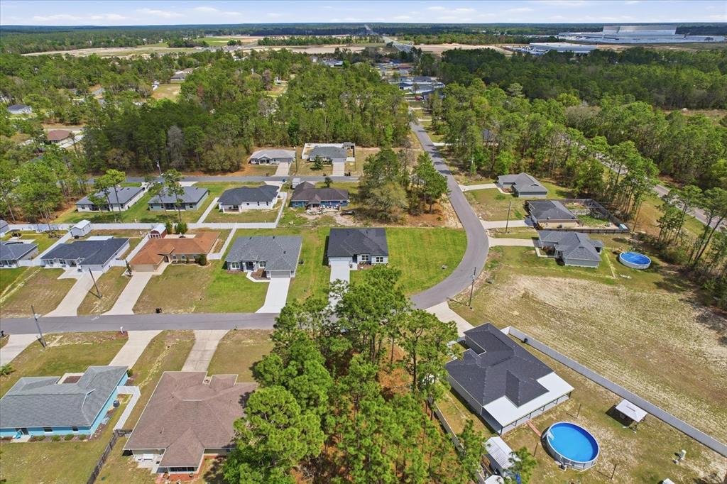 6349 Southwest 134th Loop Ocala, FL 34473 - Photo 44 of 45 an aerial view of residential houses with outdoor space