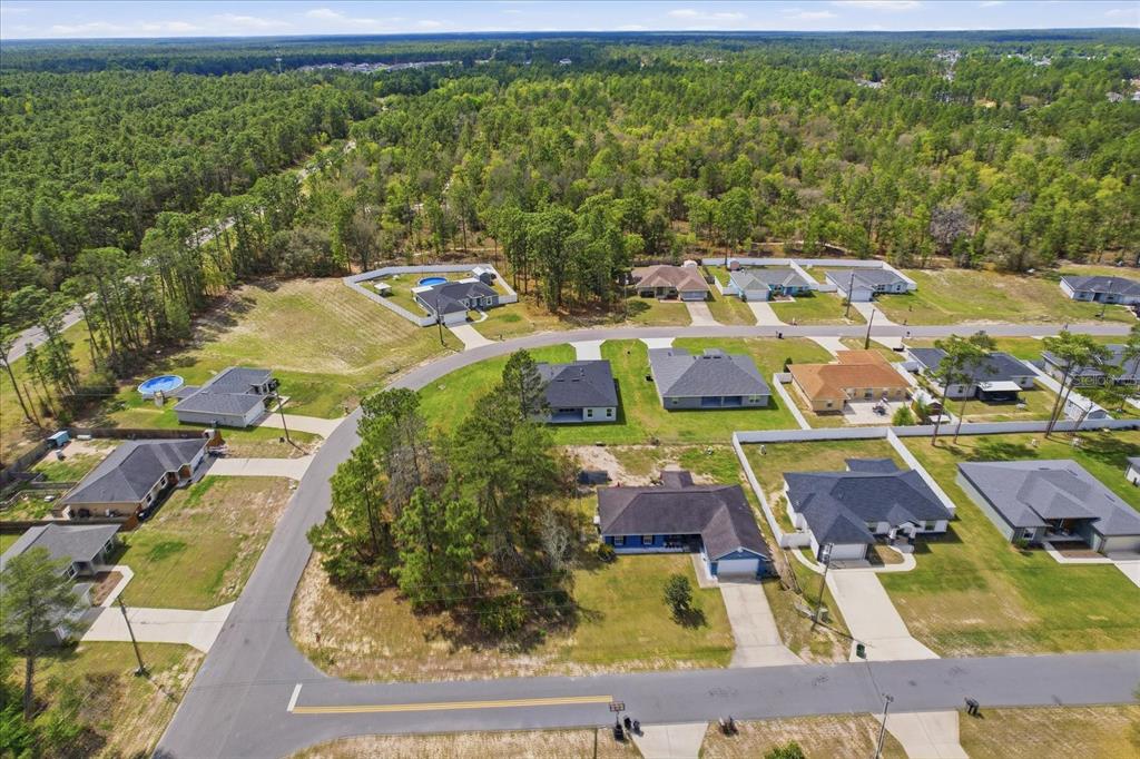 6349 Southwest 134th Loop Ocala, FL 34473 - Photo 45 of 45 an aerial view of residential houses with outdoor space