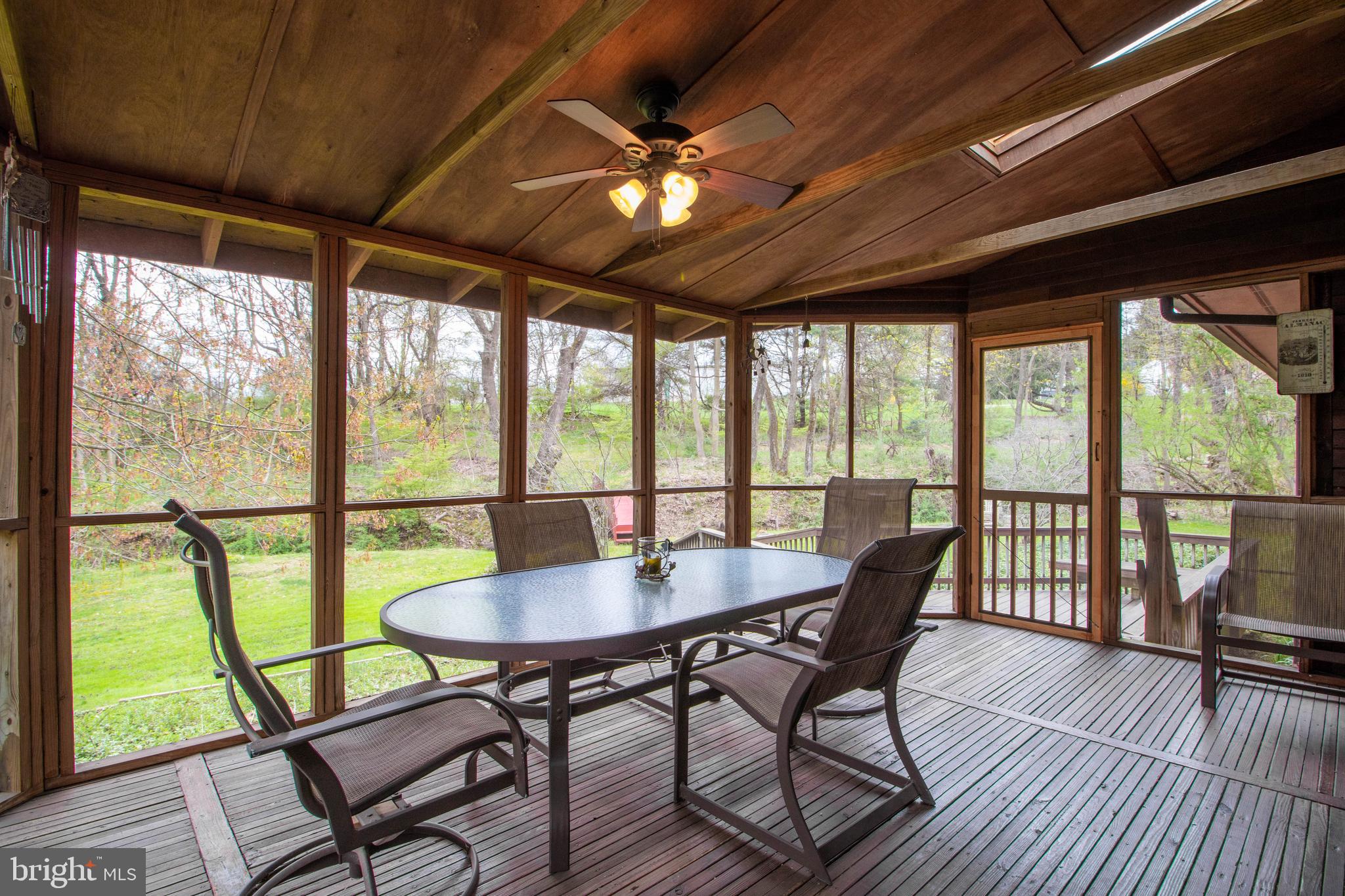 817 Marlboro Spring Road Kennett Square, PA 19348 - Photo 14 of 34 Expanded Screened in Porch with Fan