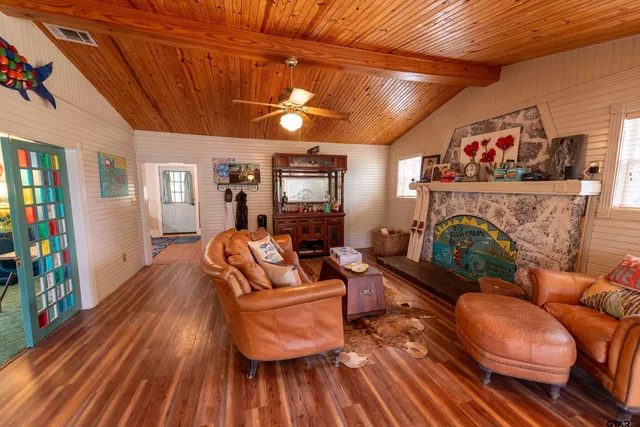 a bedroom with a bed and windows