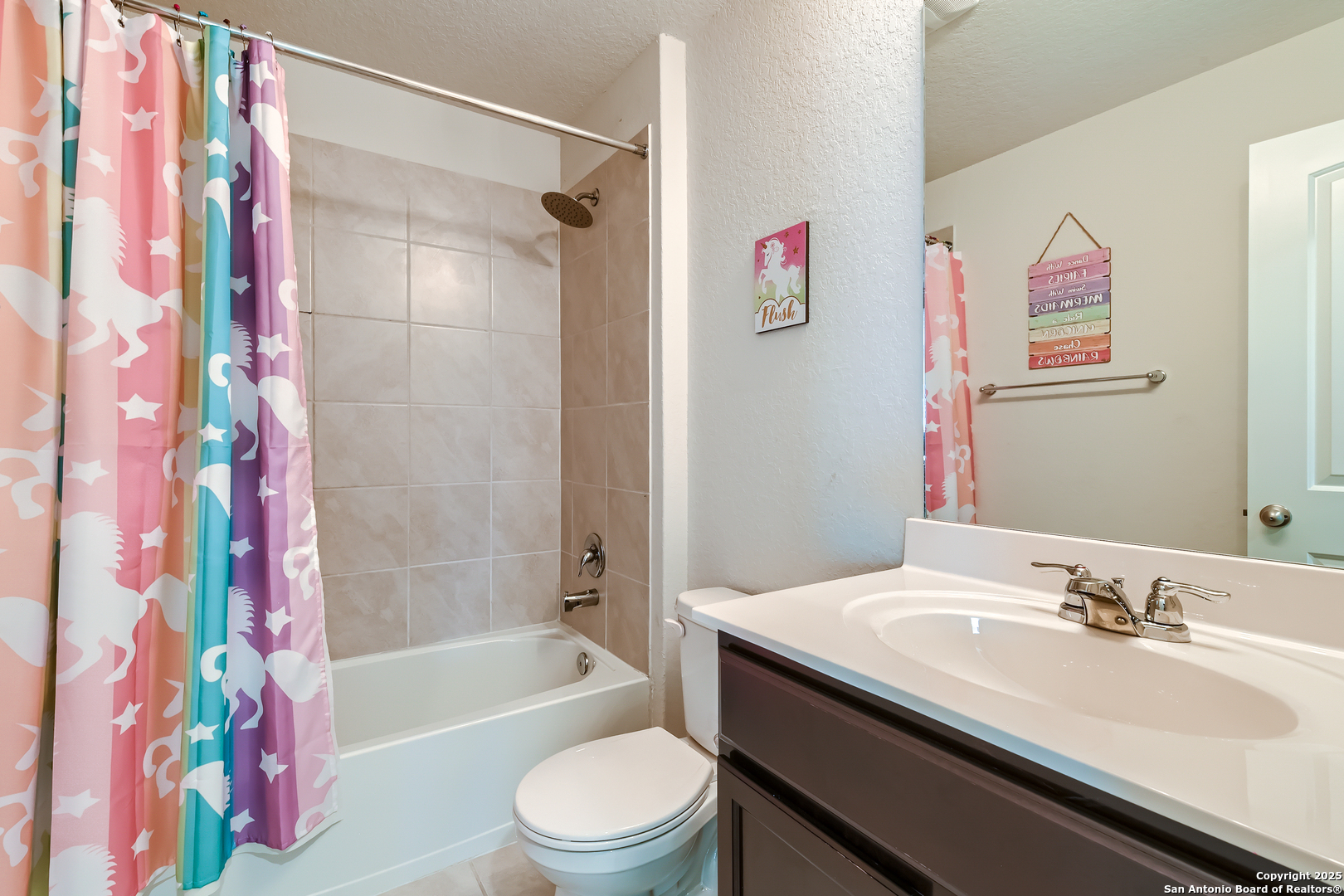 13322 Silky Rye San Antonio, TX 78254 - Photo 24 of 44 a bathroom with a sink a toilet and a bathtub