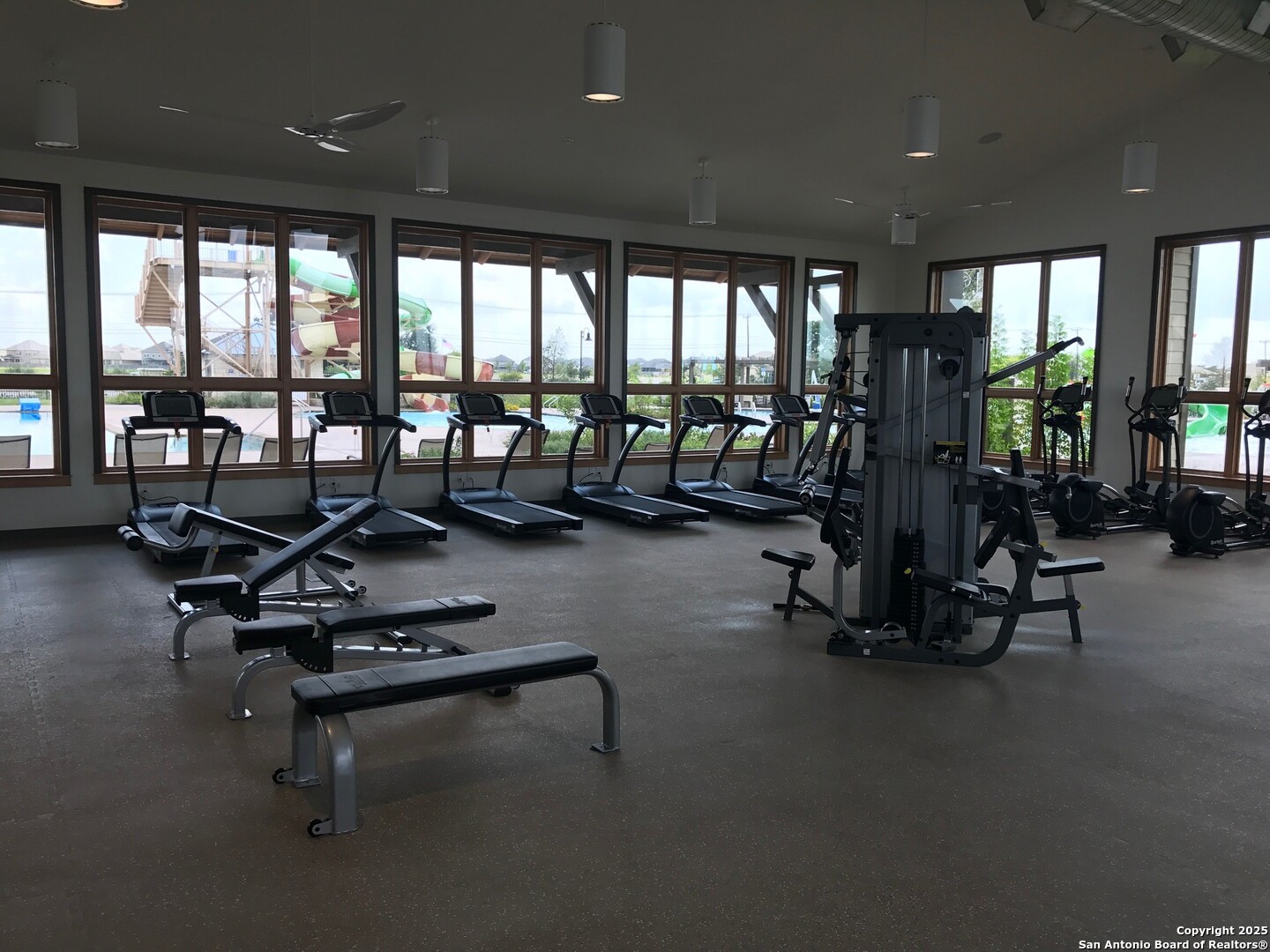 13322 Silky Rye San Antonio, TX 78254 - Photo 35 of 44 a living room with furniture a air conditioner and floor to ceiling window