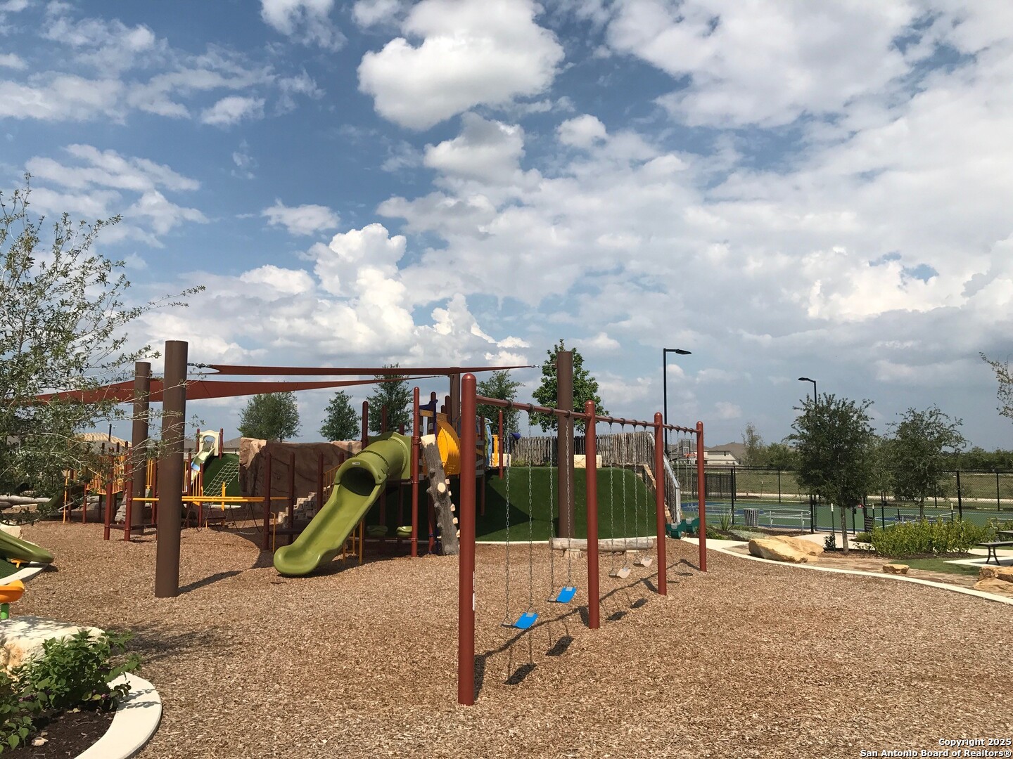 13322 Silky Rye San Antonio, TX 78254 - Photo 41 of 44 a view of a park with swings