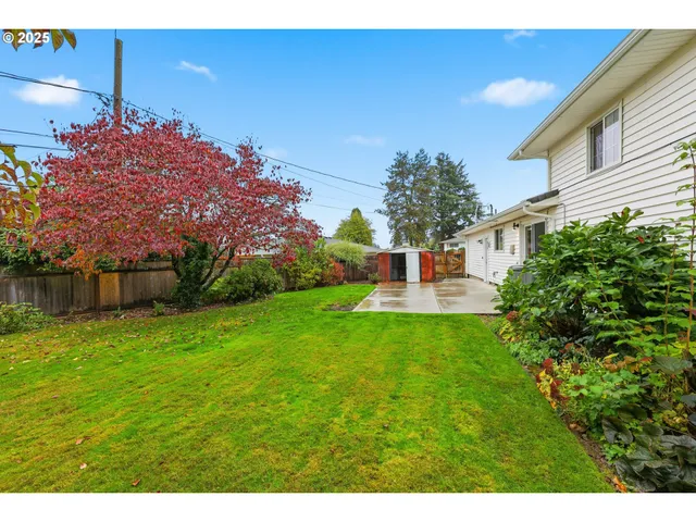 a backyard of a house with lots of green space
