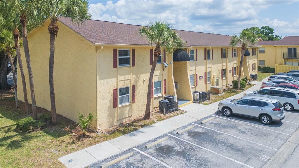 7531 Abonado Road, Unit 1 Tampa, FL 33615 - Photo 1 of 26 a car parked in front of a house