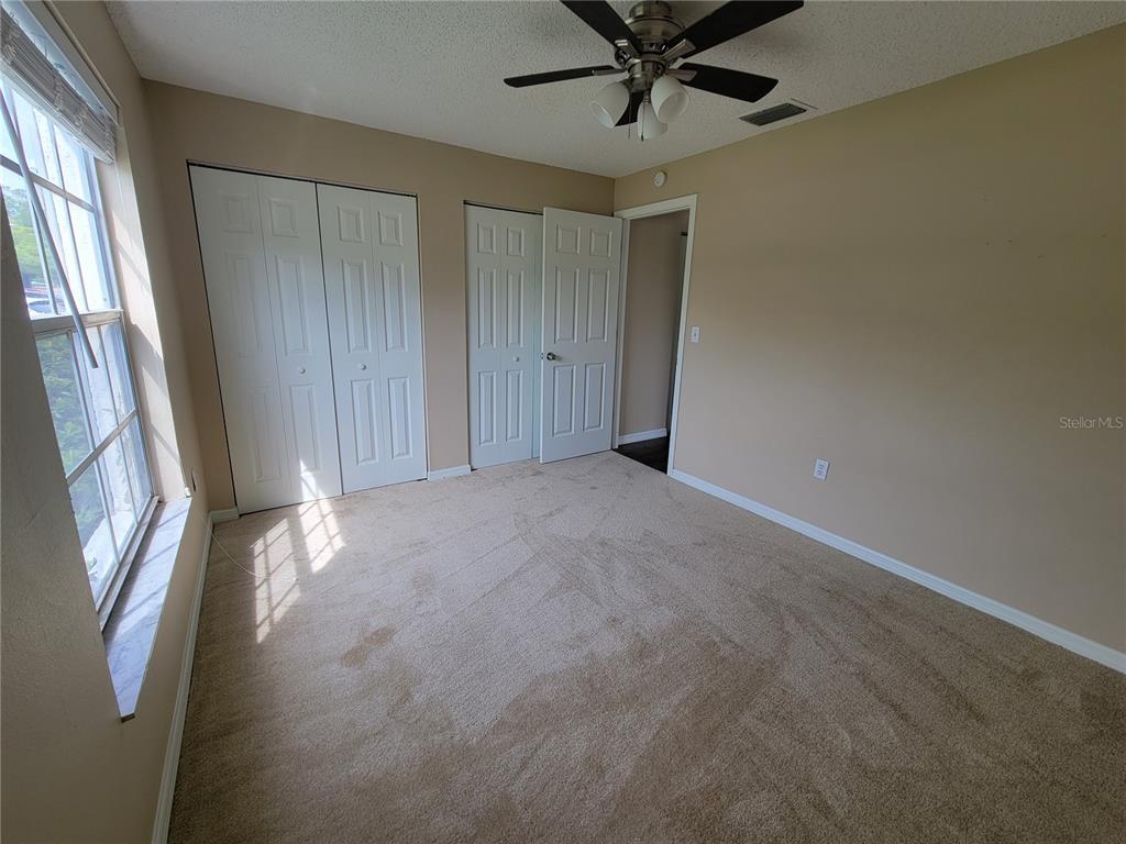 7401 Jenner Avenue New Port Richey, FL 34655 - Photo 11 of 14 a view of an empty room with a window