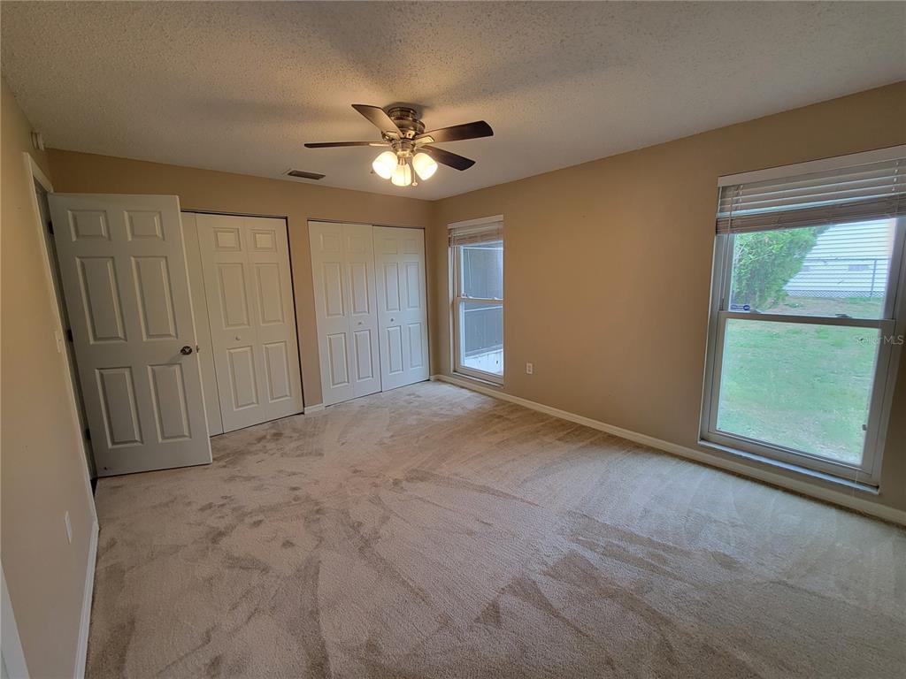 7401 Jenner Avenue New Port Richey, FL 34655 - Photo 7 of 14 a view of an empty room with a window