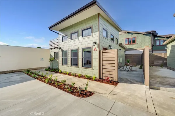 a front view of a house with a garage