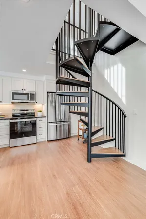 a work room with furniture and potted plant