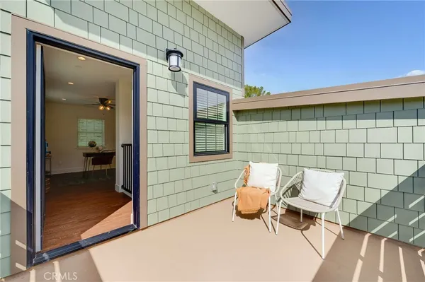 a view of multiple houses with a street