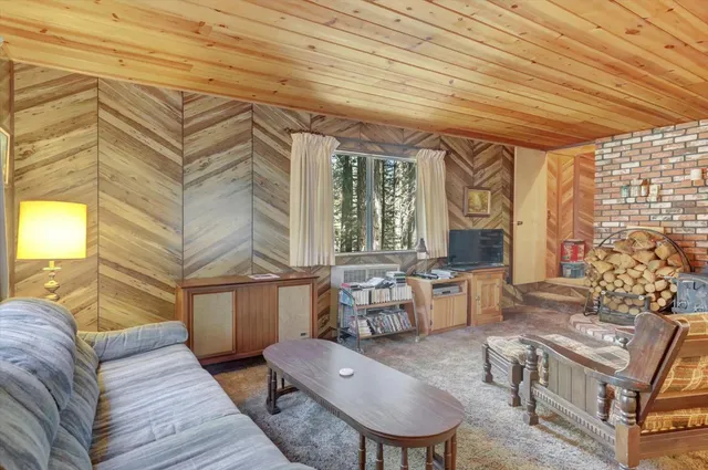 a bedroom with a bed and a view of bedroom