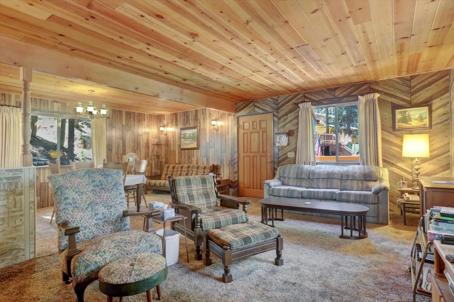 351 Silver Tip Springs Road Strawberry Valley, CA 95981 - Photo 14 of 57 a living room with furniture and a fireplace