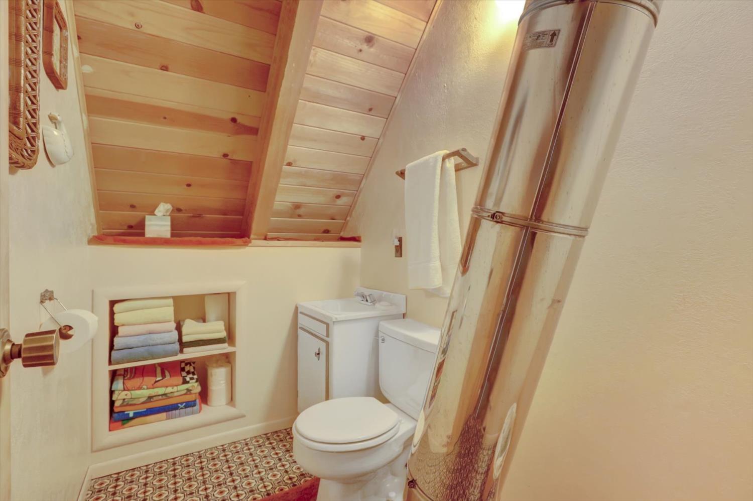 351 Silver Tip Springs Road Strawberry Valley, CA 95981 - Photo 20 of 57 a bathroom with a toilet a sink and a shower