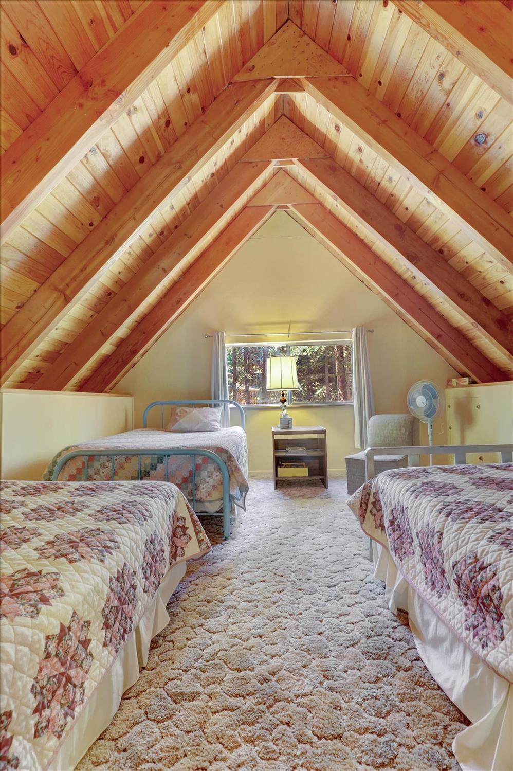 351 Silver Tip Springs Road Strawberry Valley, CA 95981 - Photo 21 of 57 a bedroom with a bed and a view of bedroom