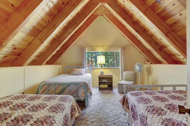 a view of a yard with trees